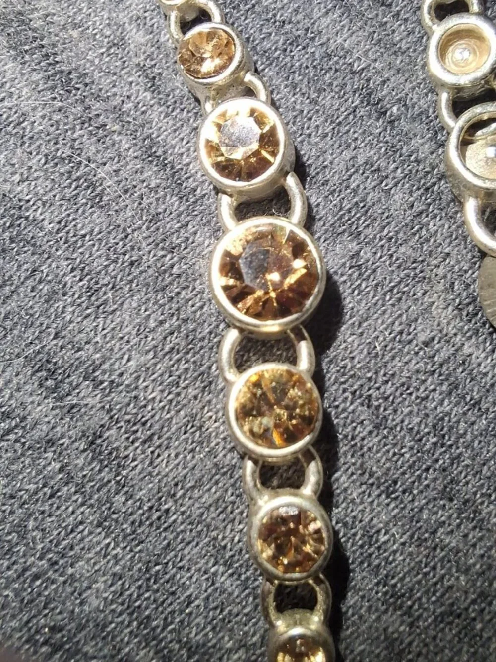 Vtg signed Graduated Dangle Hook crystal bezel Earrings signed F fossil?
